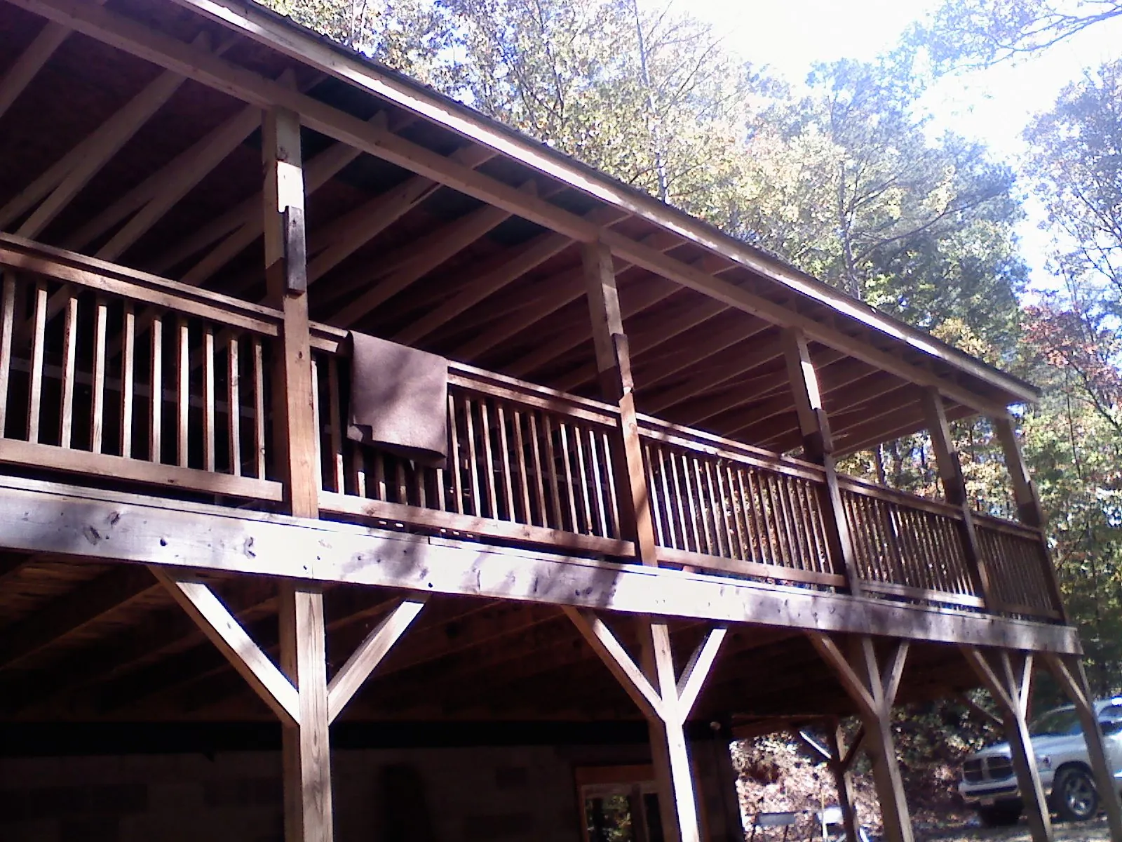 Timber framing under a new elevated porch and deck — Roof Leak Repair in Reevesville by Roofing Brothers
